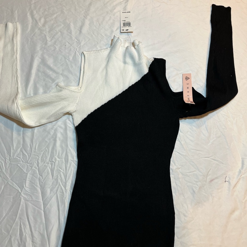 Fame Two-Tone Black and White sweater of the shoulder new with tags size small